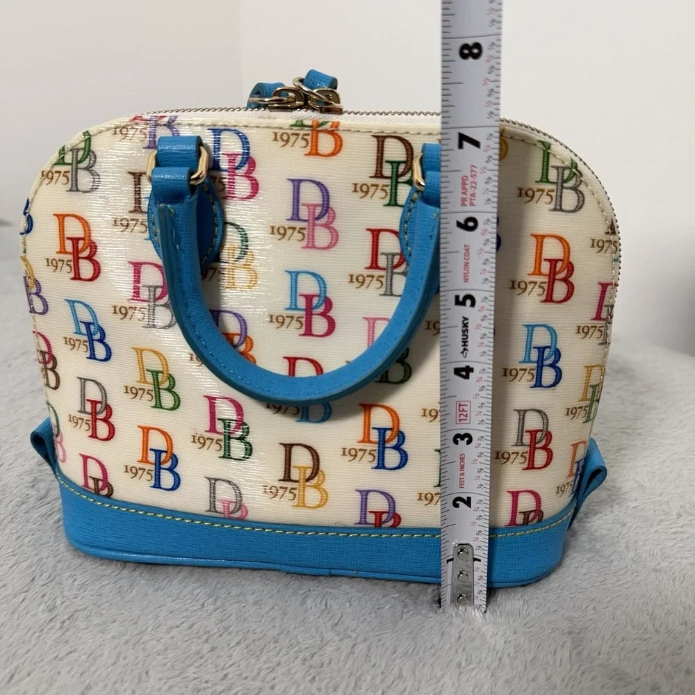 Dooney & Bourke 1975 Logo Bag Domed Crossbody Ruby Top Handle Wht/ Multi Zip Top - Picture 10 of 12
